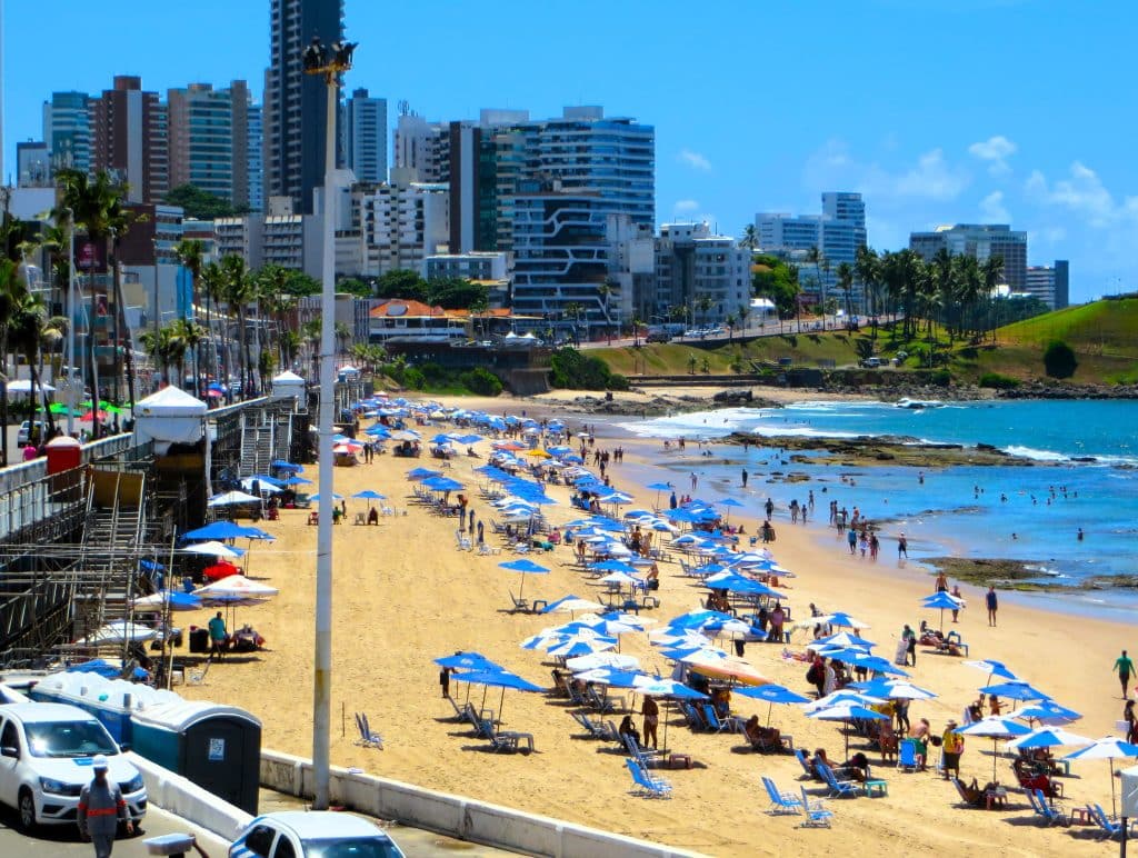 Farol da Barra Beach blue and white umbrellas places to visit in Salvador